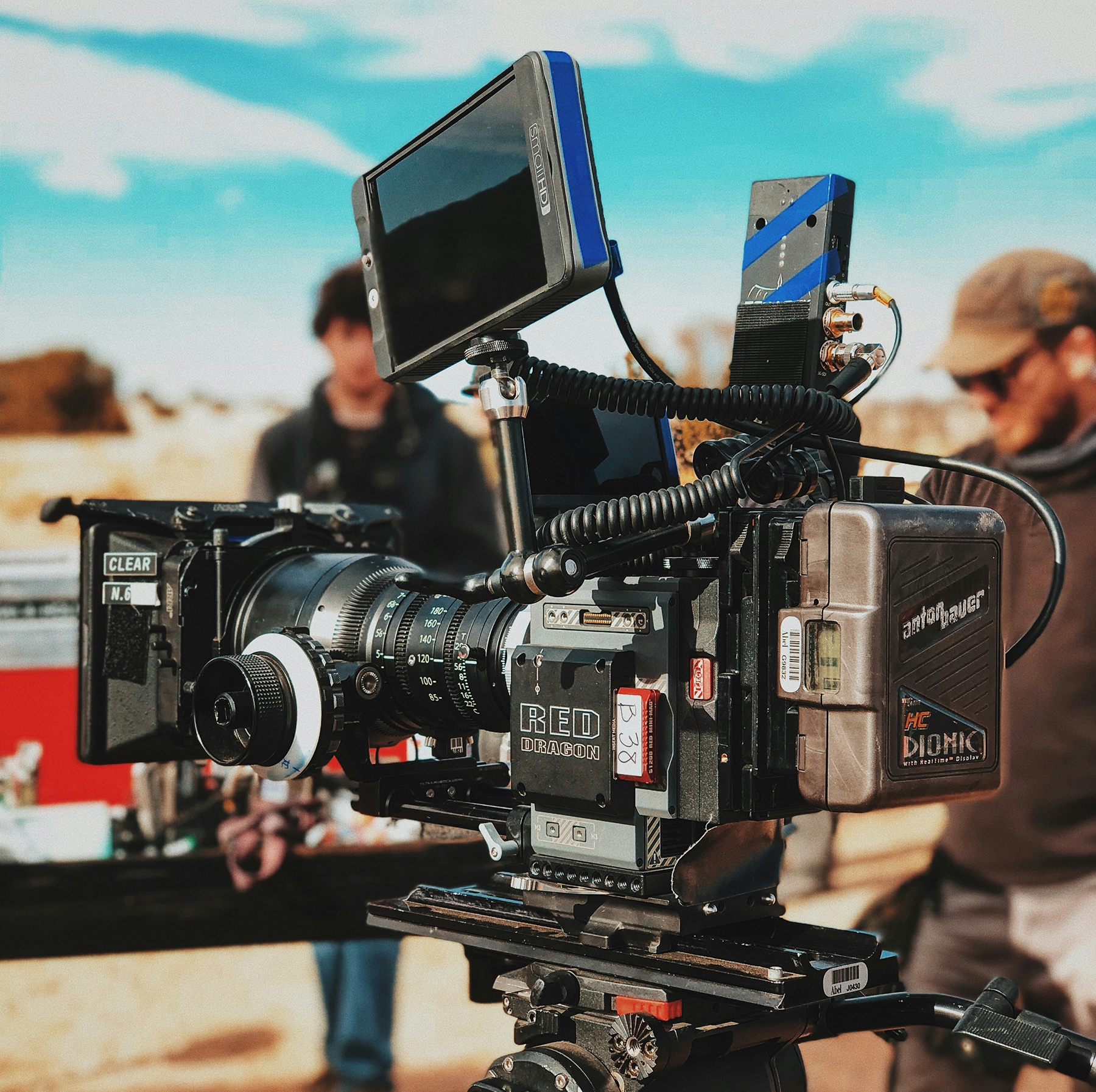 Close up of Red Dragon film camera in front of film crew Film production Event Logistics Stage & screen